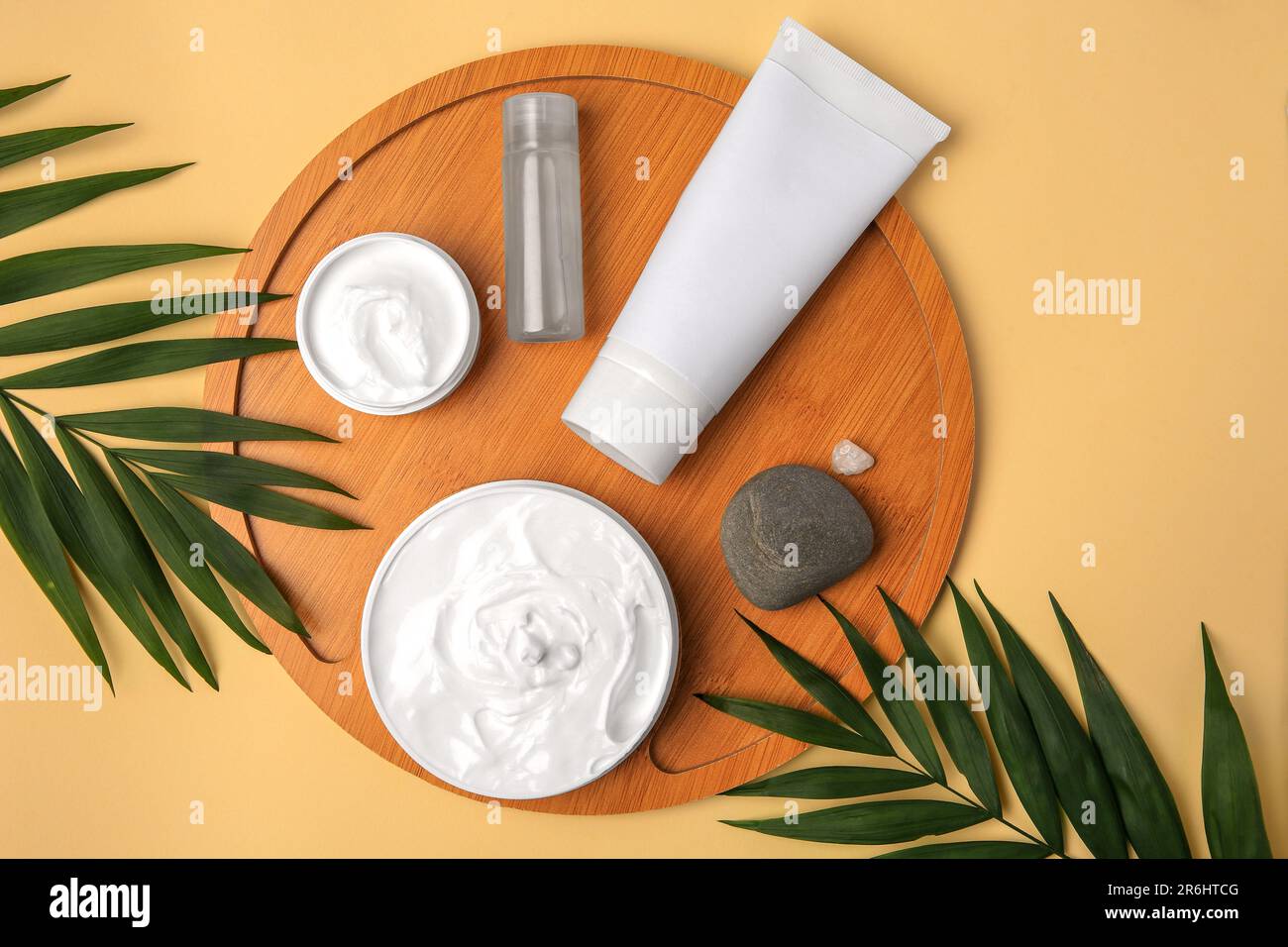 Flat lay composition with different cosmetic products on beige ...