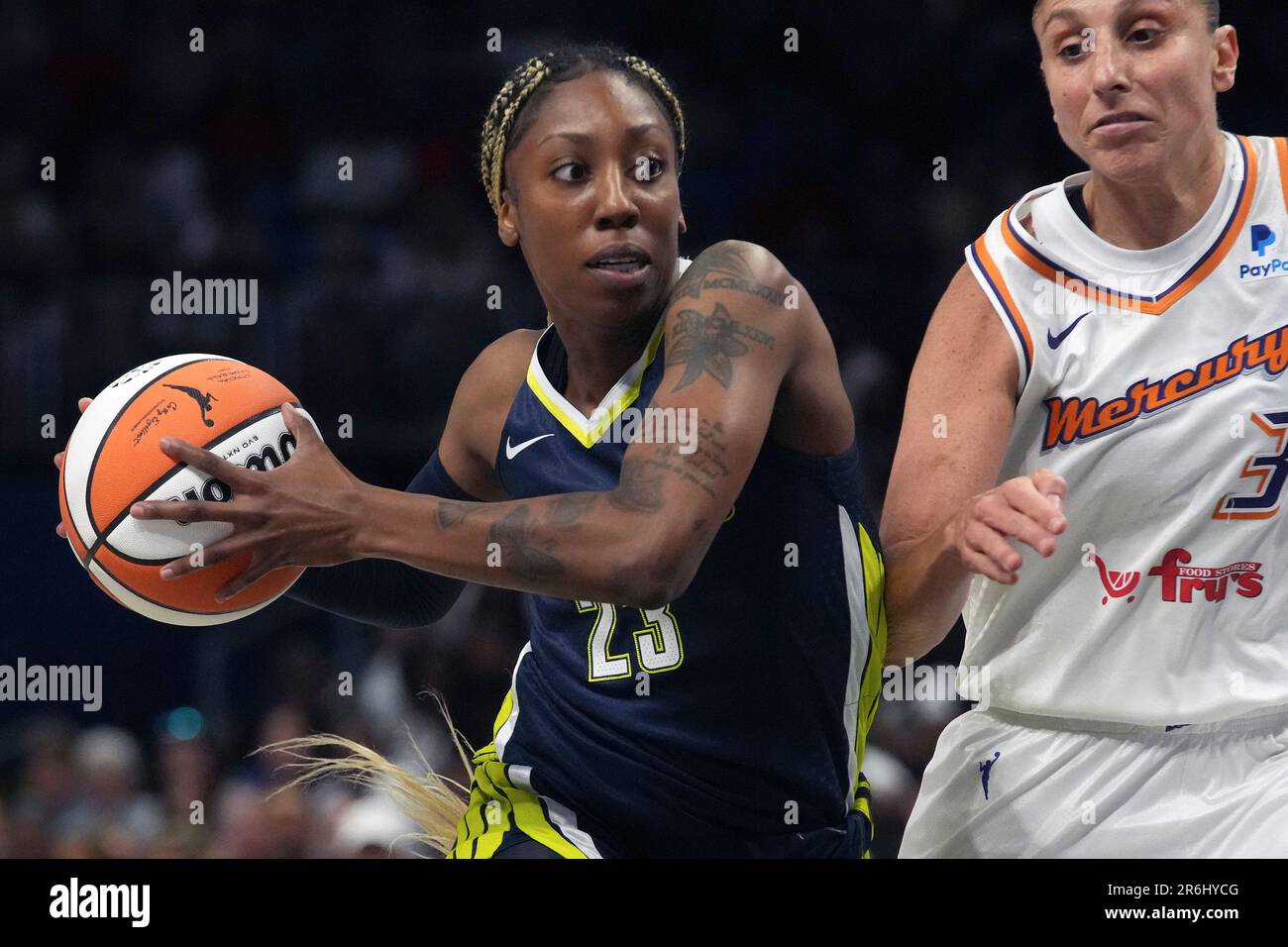 Dallas Wings guard Jasmine Dickey (23) drives against Phoenix Mercury