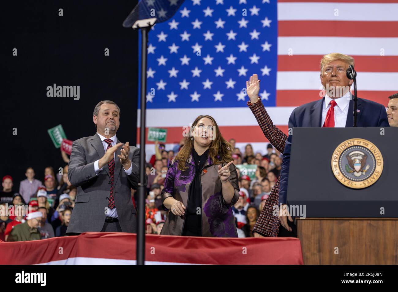President Donald Trump speaks at a rally in Battle Creek, Michigan concurrent to the House of Representatives voting to impeach him. Stock Photo