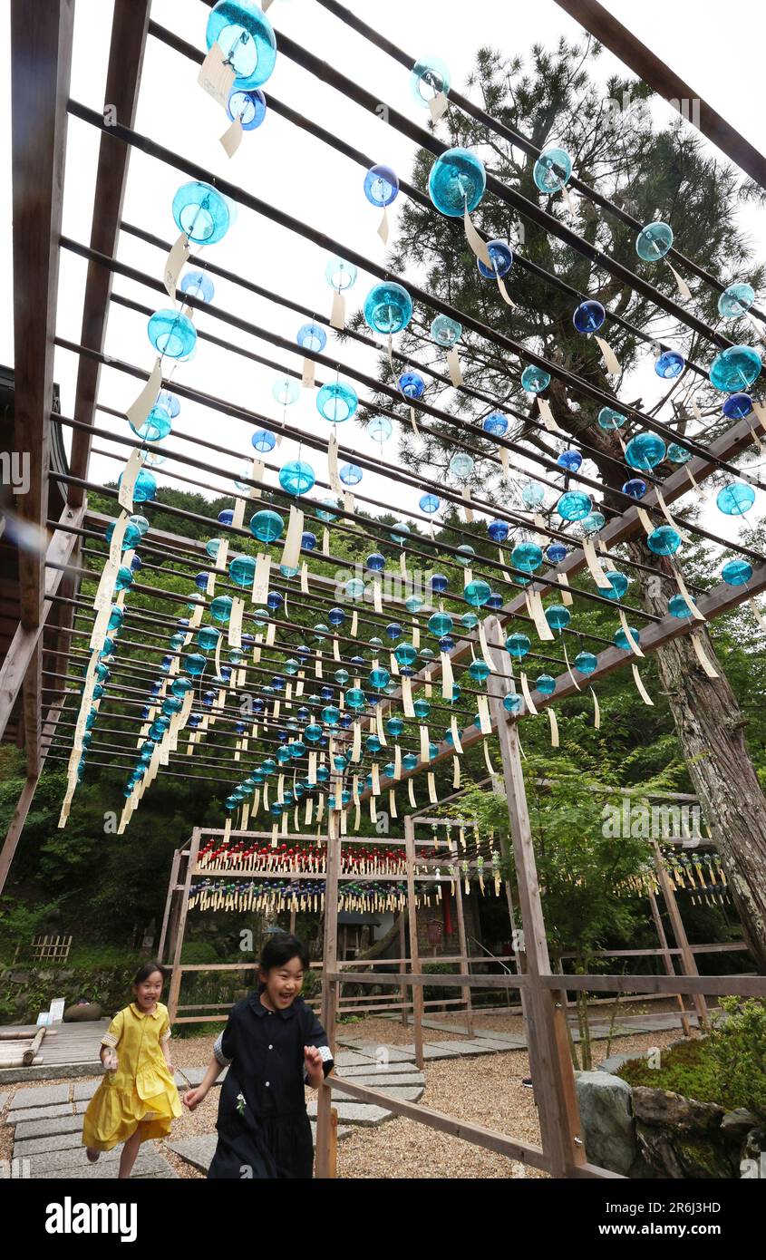 Over 2,000 wind chimes are hung in the corridor and swaying in the wind