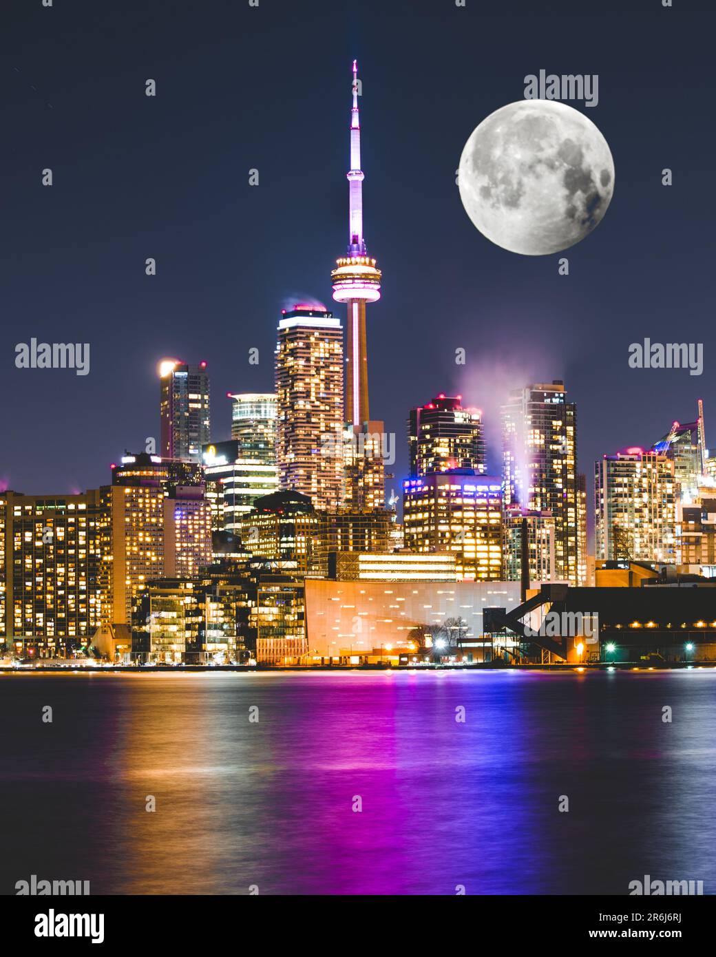 A full moon rising over Toronto in Canada long exposure Stock Photo Alamy