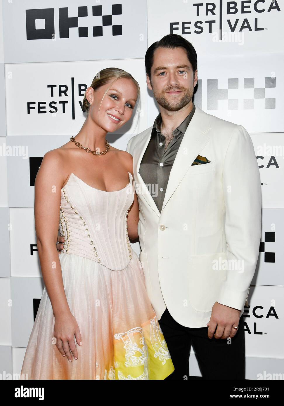 Richard Rankin, right, and girlfriend Sammie Russell attend the