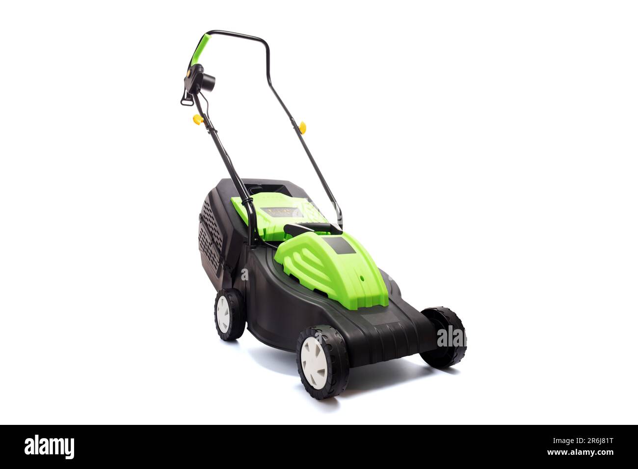 Garden electric lawn mower with a grass collector isolated on white