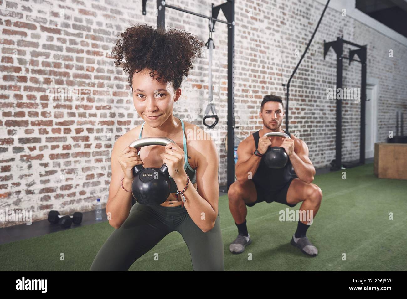Exercise benefits more than just your body. two sporty young people ...
