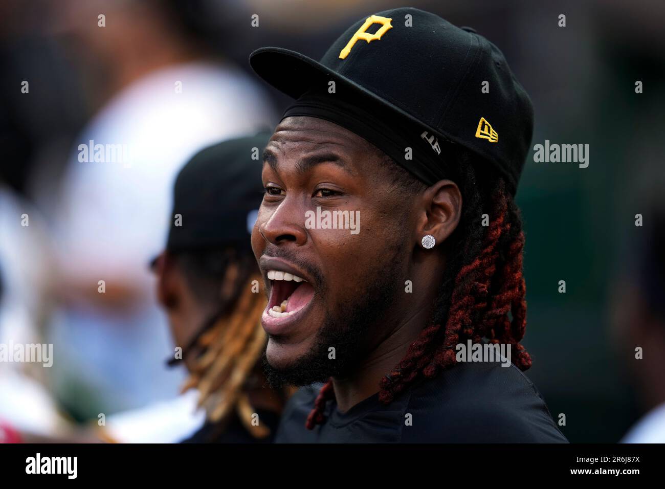 Pittsburgh Pirates' Oneil Cruz visits the dugout during a baseball