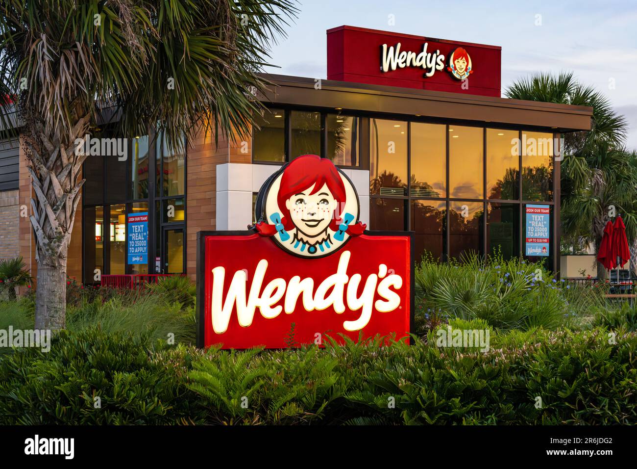 Wendy's fast food restaurant at dusk in Jacksonville, Florida. (USA