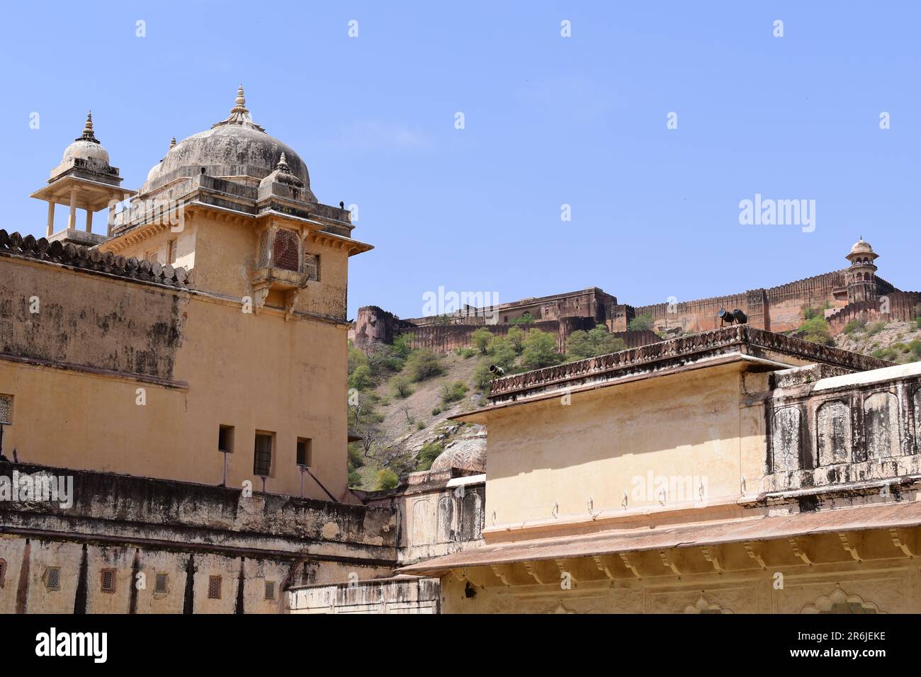 View of the fourth courtyard of Amber Palace in the foreground and the Jaigarh fort in the background. Stock Photo