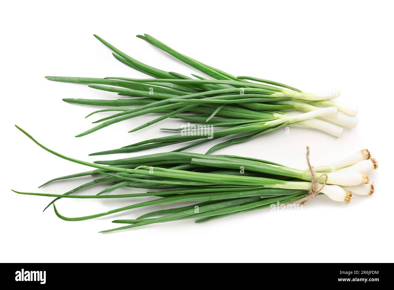 Fresh green onion on white background Stock Photo - Alamy
