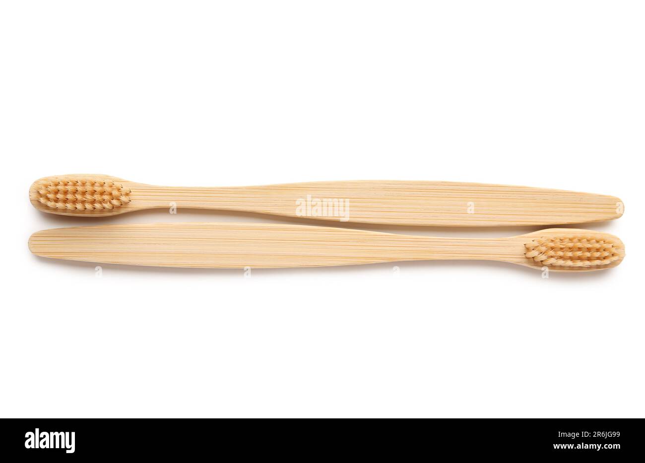 Bamboo toothbrushes on white background Stock Photo - Alamy