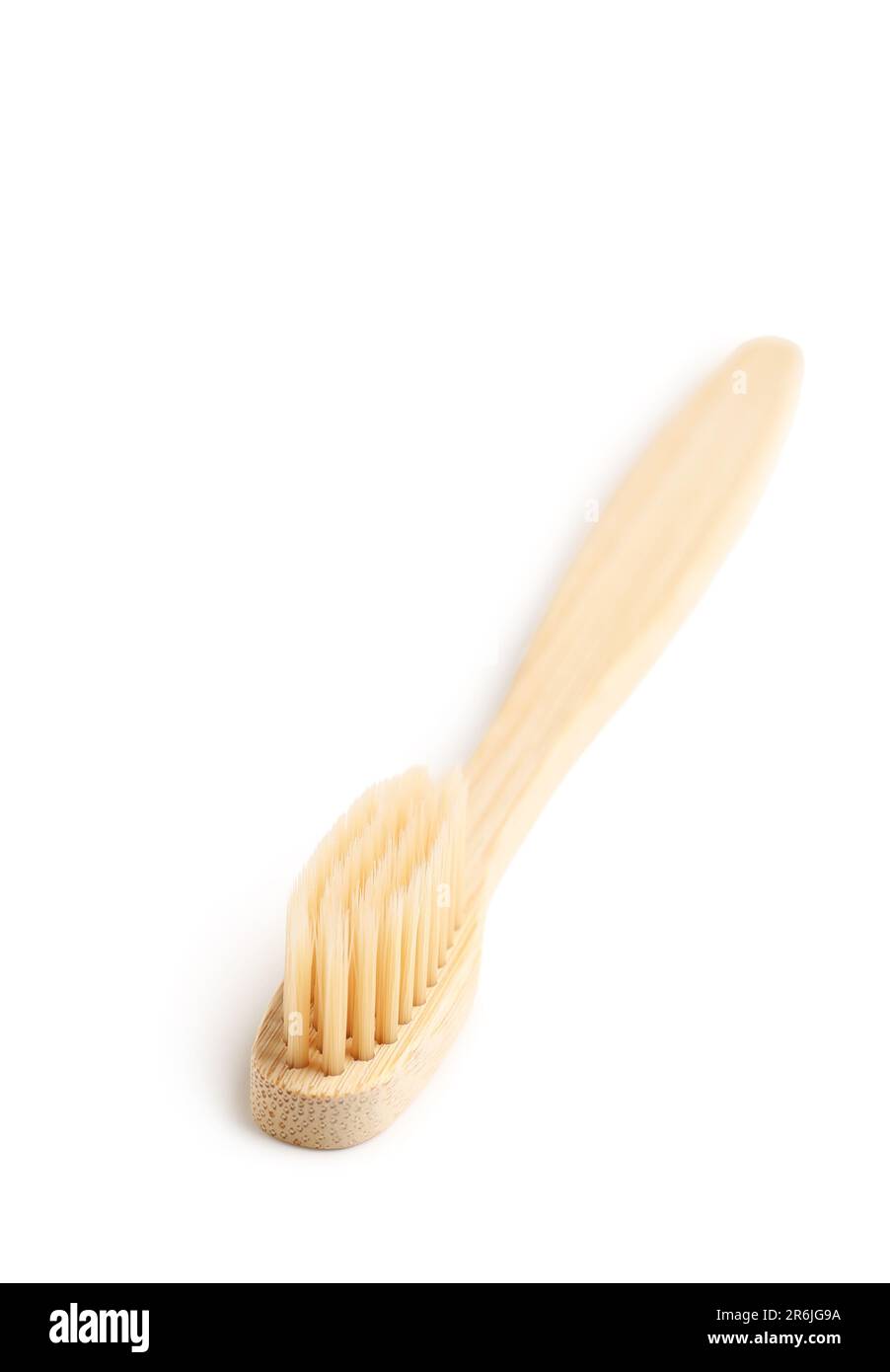 Bamboo toothbrush on white background Stock Photo - Alamy