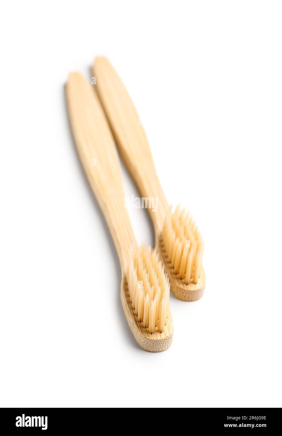 Bamboo toothbrushes on white background Stock Photo - Alamy
