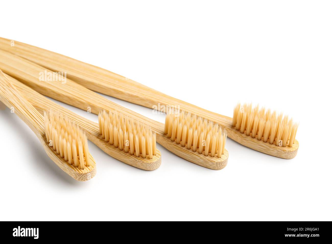 Many bamboo toothbrushes on white background Stock Photo - Alamy