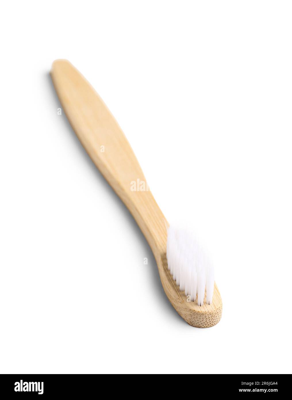 Bamboo toothbrush on white background Stock Photo - Alamy