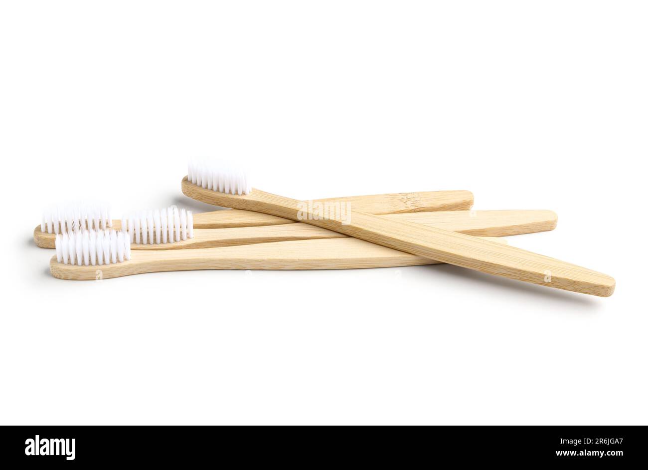 Many bamboo toothbrushes on white background Stock Photo - Alamy