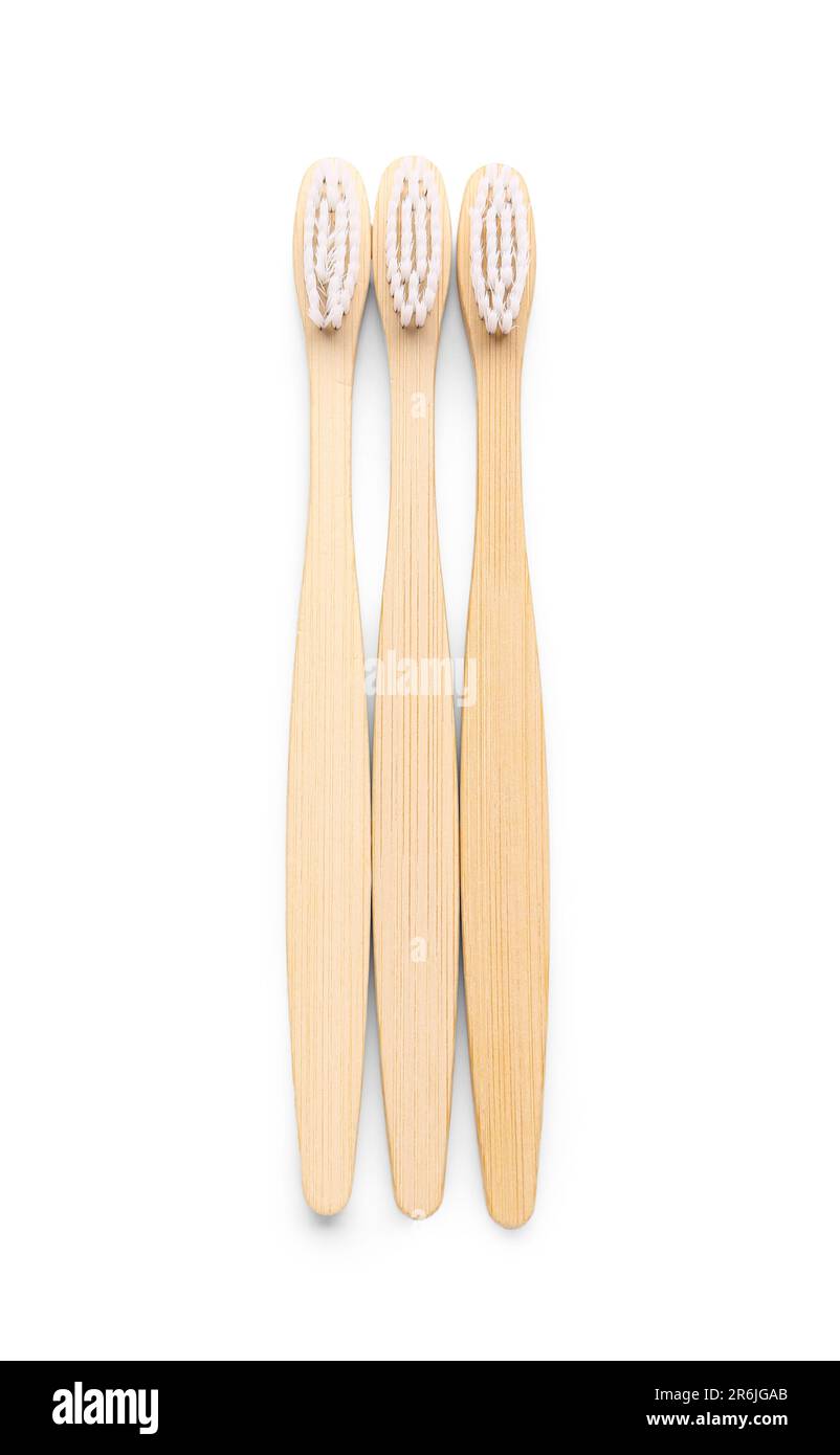Bamboo toothbrushes on white background Stock Photo - Alamy