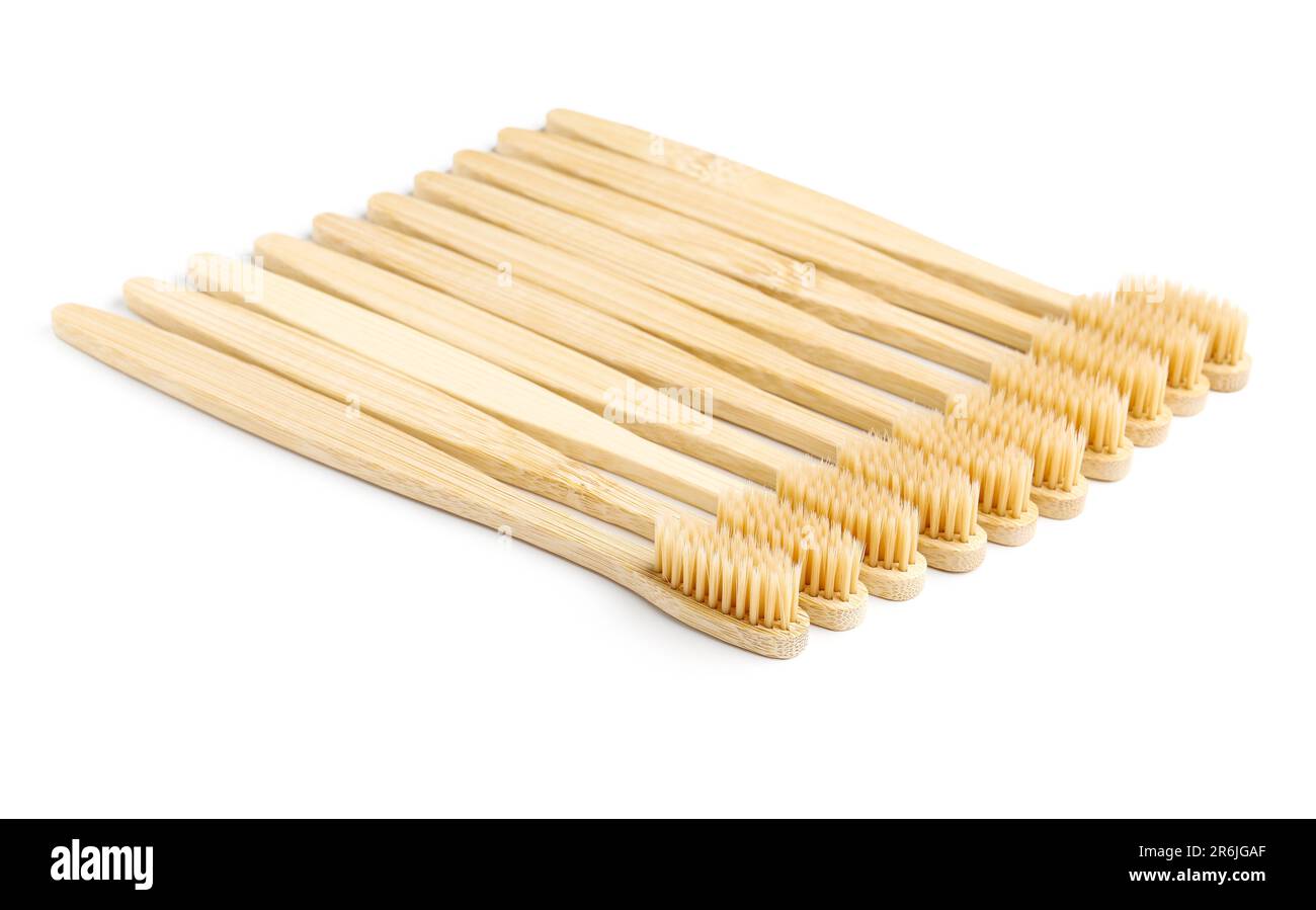 Many bamboo toothbrushes on white background Stock Photo - Alamy