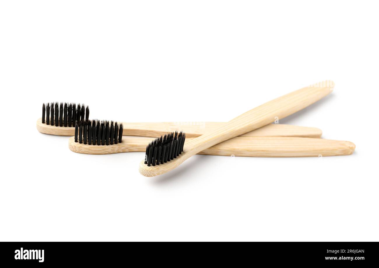 Bamboo toothbrushes on white background Stock Photo - Alamy