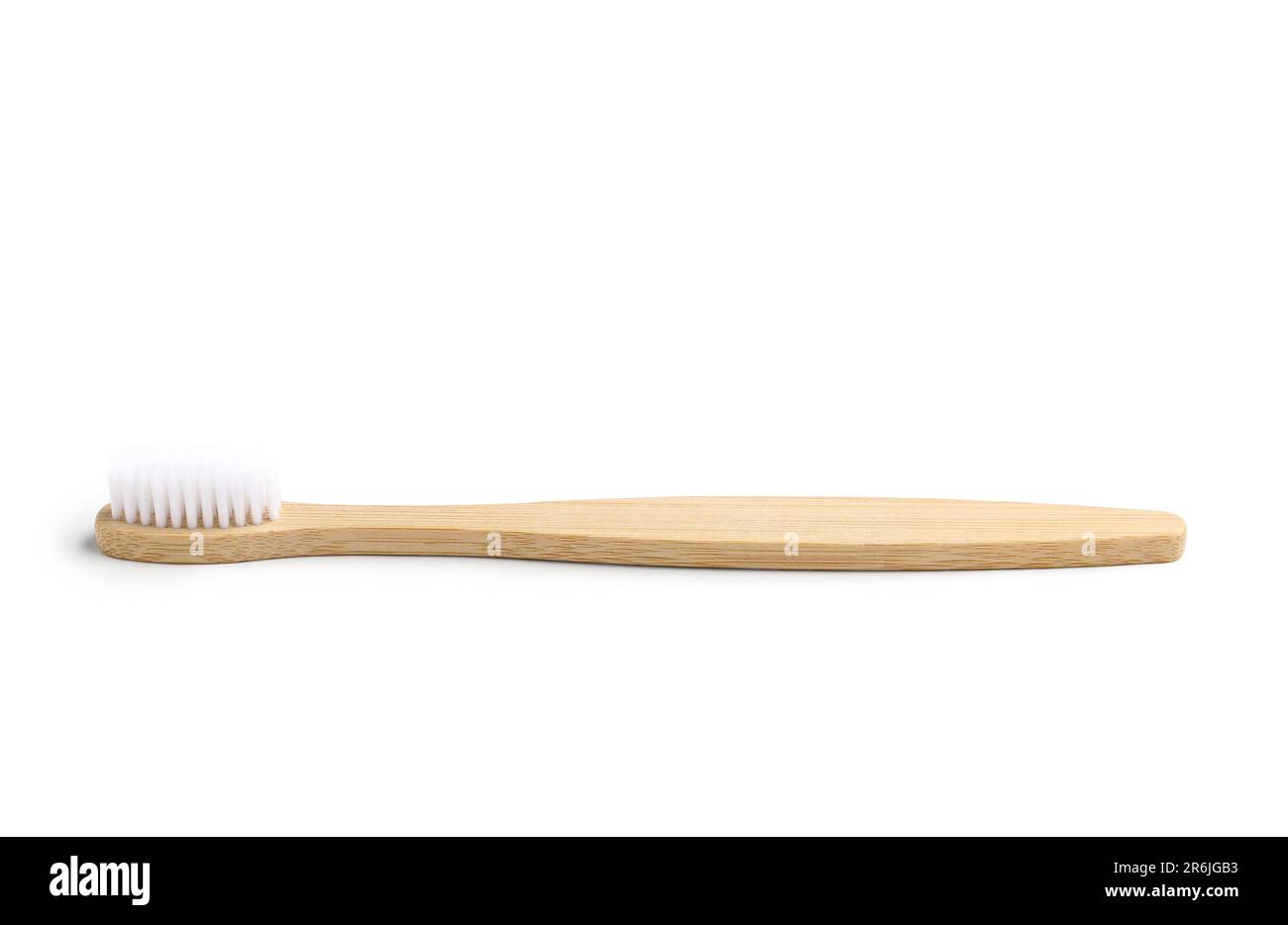 Bamboo toothbrush on white background Stock Photo - Alamy
