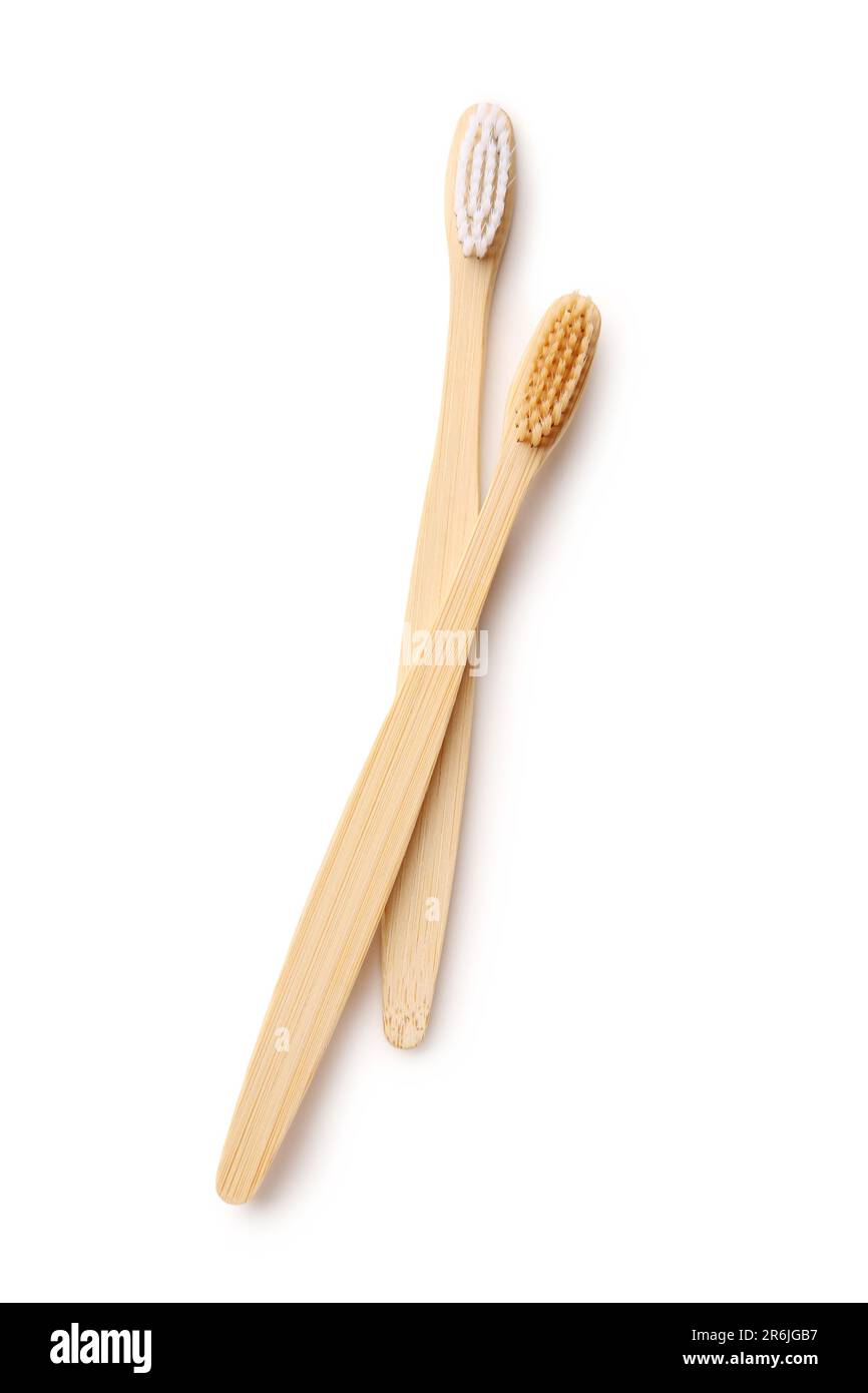 Different bamboo toothbrushes on white background Stock Photo - Alamy