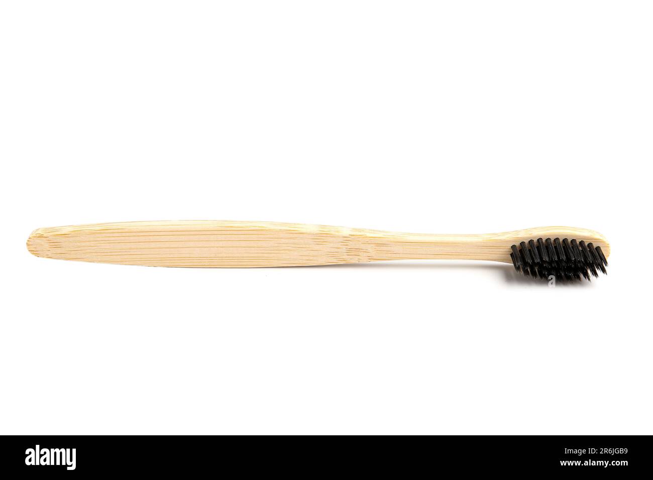 Bamboo toothbrush on white background Stock Photo - Alamy