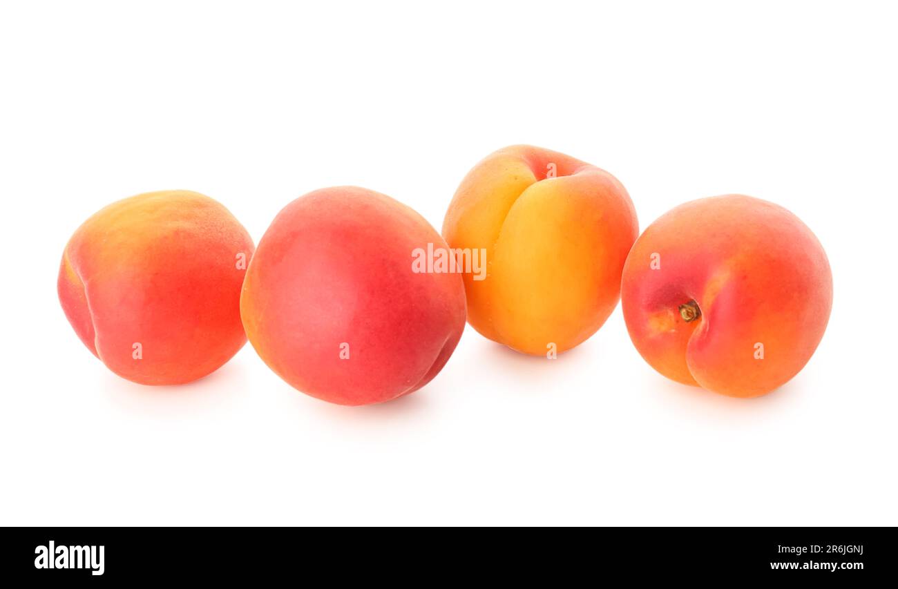 Ripe apricots isolated on white background Stock Photo - Alamy