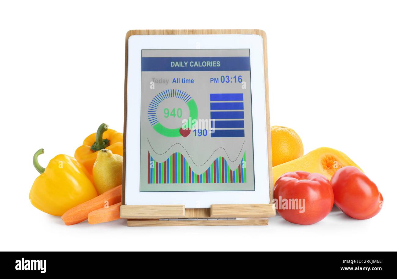 Tablet with weight loss calculator application and food products on ...