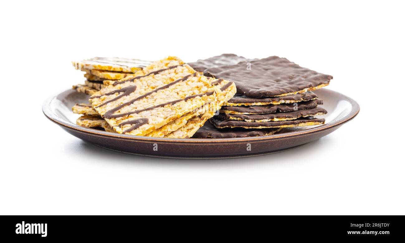 Puffed corn crackers chocolate covered isolated on the white background. Stock Photo