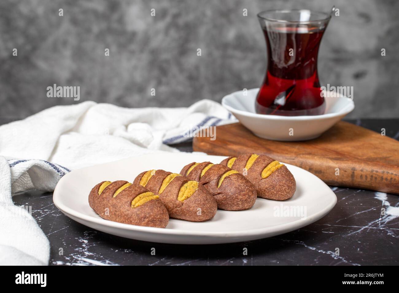 Cookies with tahini and pistachio. Homemade cookies on dark background Stock Photo