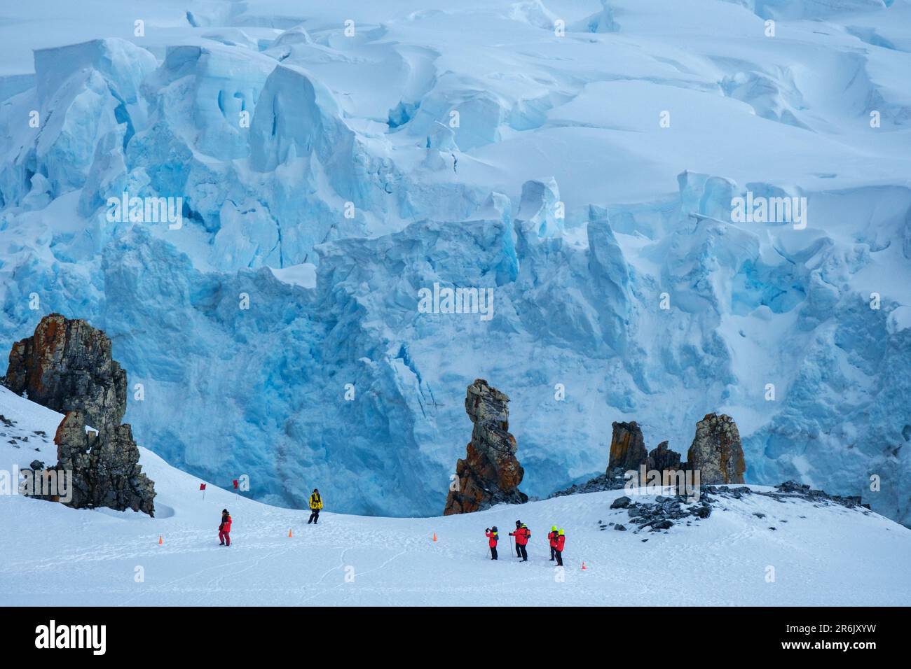 Hikers climbing Half Moon Island, South Shetland Islands, Antarctica, Polar Regions Stock Photo