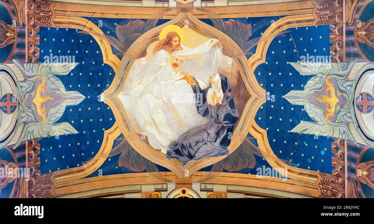 GENOVA, ITALY - MARCH 7, 2023: The fresco of  Apparition of  Divine Mercy of Jesus in the church Chiesa di Sacro Cuore e San Giacomo from 20. cent. Stock Photo