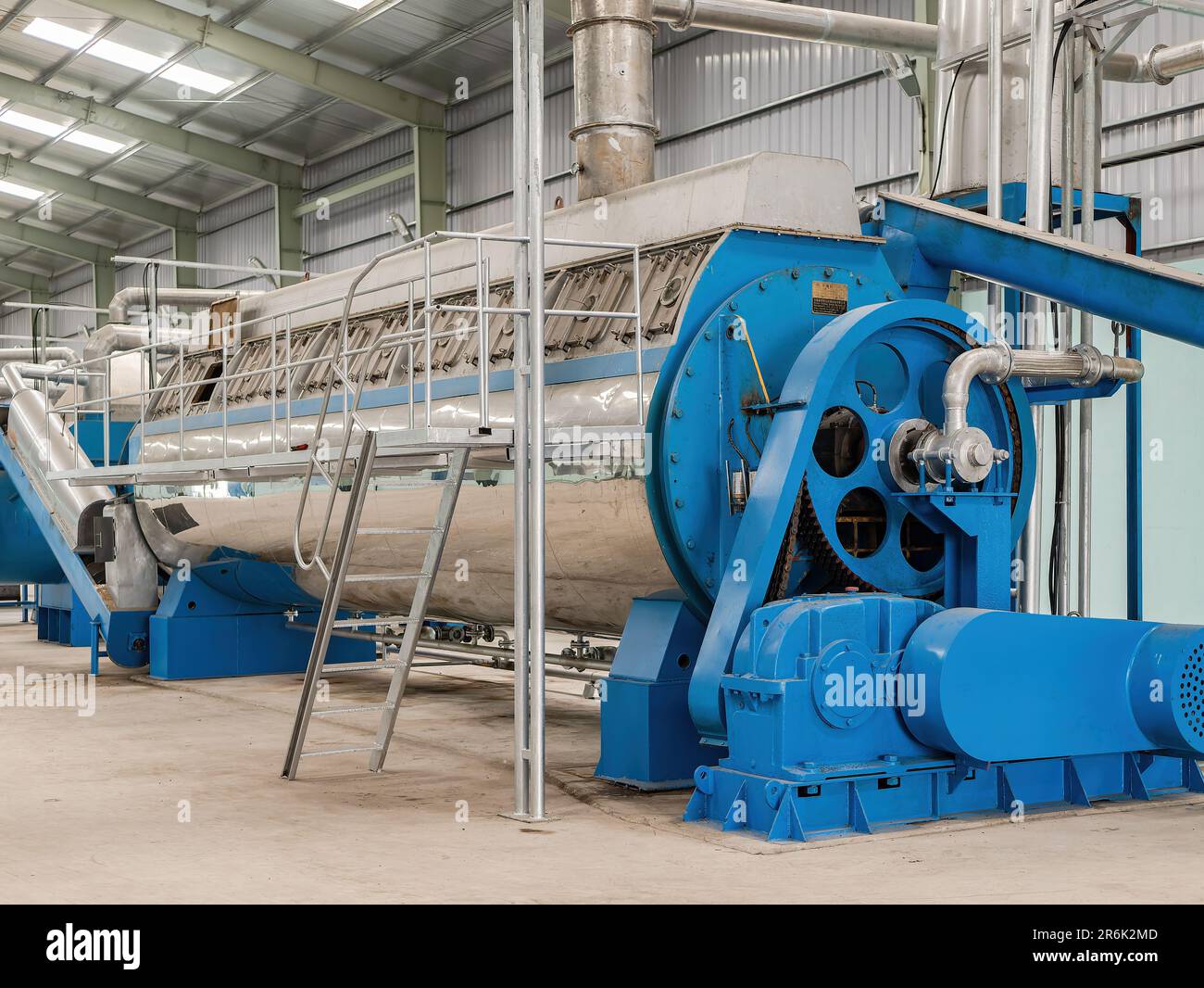 Chinese manufactured, steam heated rotary disc dryer for processing of fish byproducts to fishmeal, a useful feed ingredient for many animals, includi Stock Photo