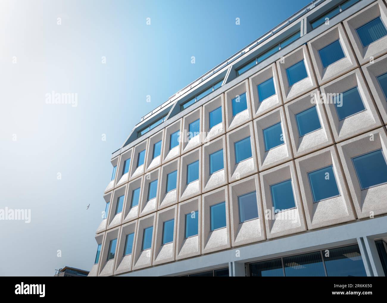 Modern Architecture with cloudless blue sky background Stock Photo - Alamy
