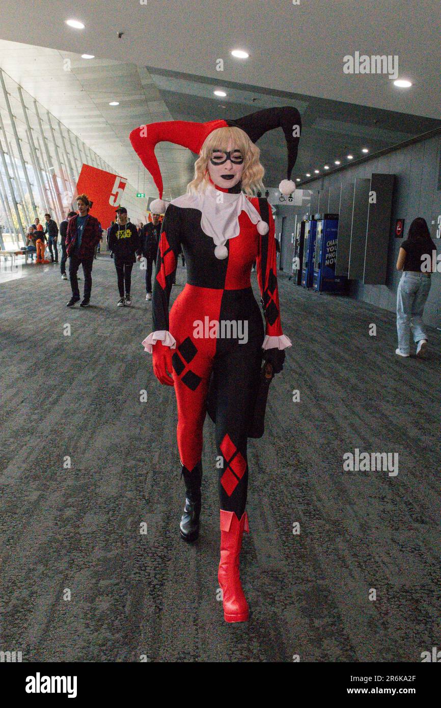 Melbourne, Australia. 10th June, 2023. A Cosplayer dressed as Harley Quinn heads to the ticket line during the OzComicCon 2023. Oz Comic Con Melbourne! The event brought together a vibrant community of fans and cosplayers, transforming the convention center into a haven of pop culture. Cosplayers dazzled with their elaborate costumes, embodying beloved characters from comics, movies, and anime. Celebrity guests engaged audiences in enthralling panels and Q&A sessions, sharing behind-the-scenes stories and inspiring insights. Exhibitors showcased a treasure trove of collectibles, merchandise, a Stock Photo