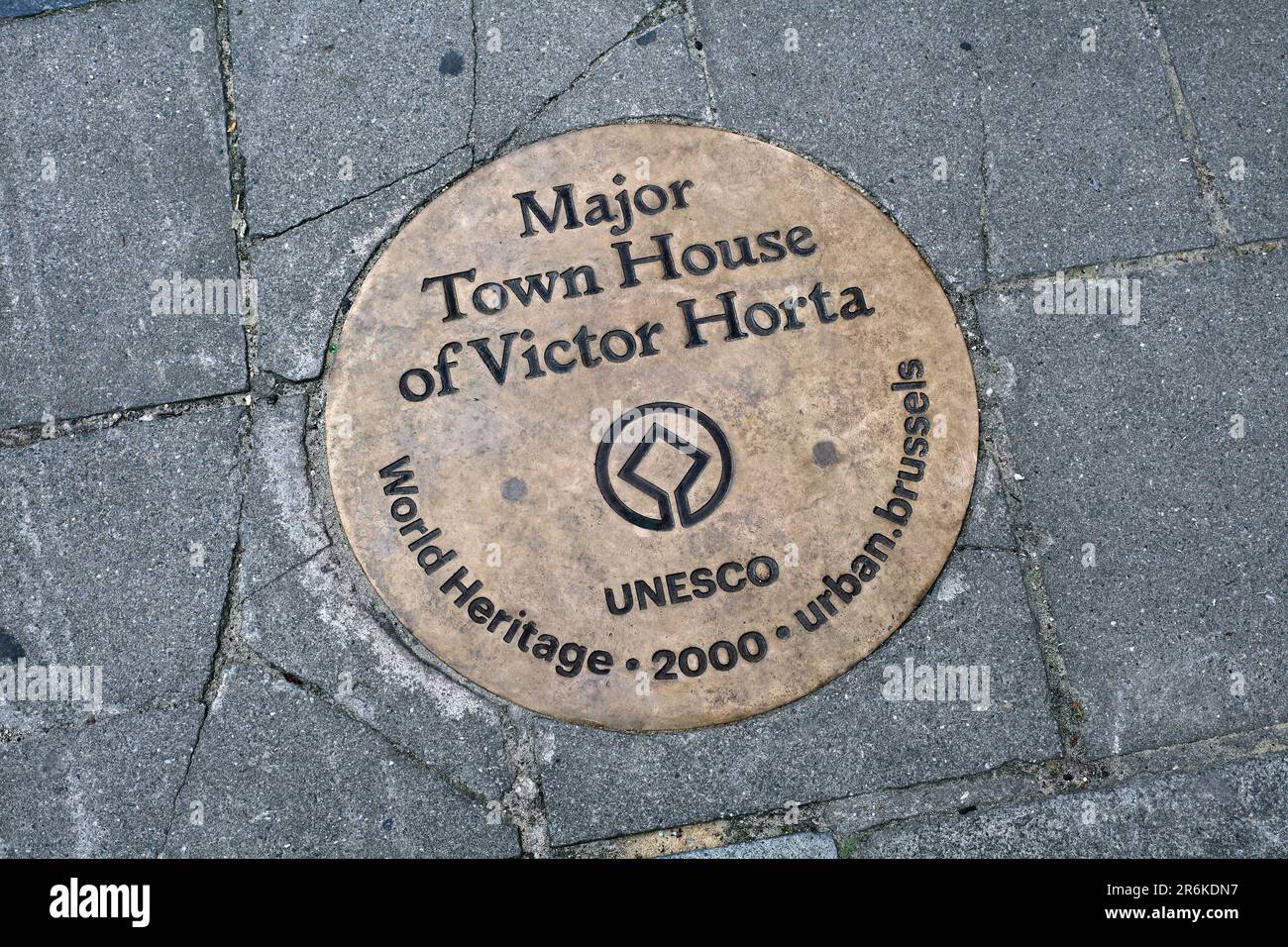 Unesco sign embedded in the pavement outside the former house and studio of architect Victor Horta in Brussels. The building is now the Horta Museum. Stock Photo