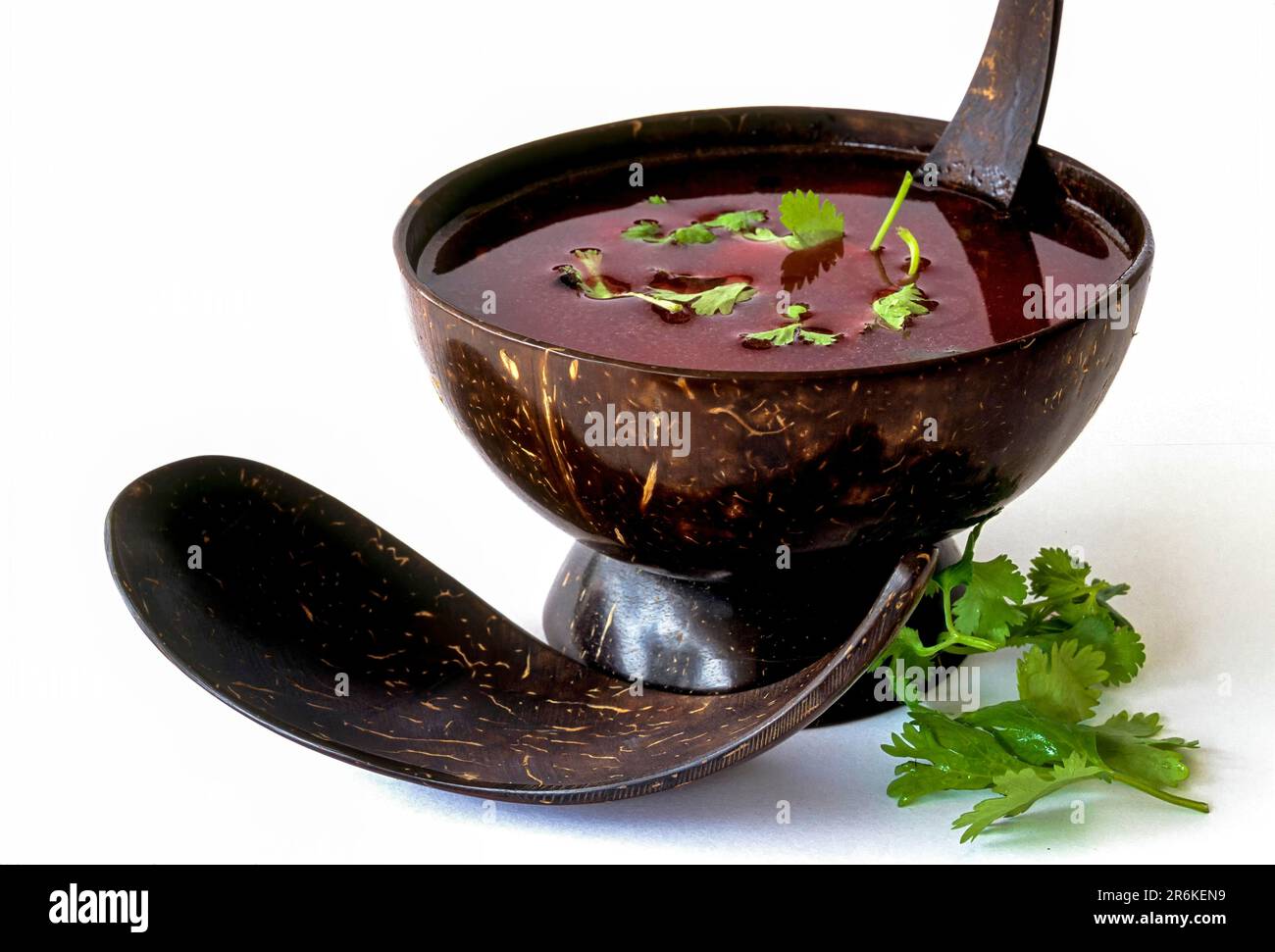 Beetroot soup in an environment friendly coconut shell cup, Tamil Nadu, South India, India, Asia Stock Photo