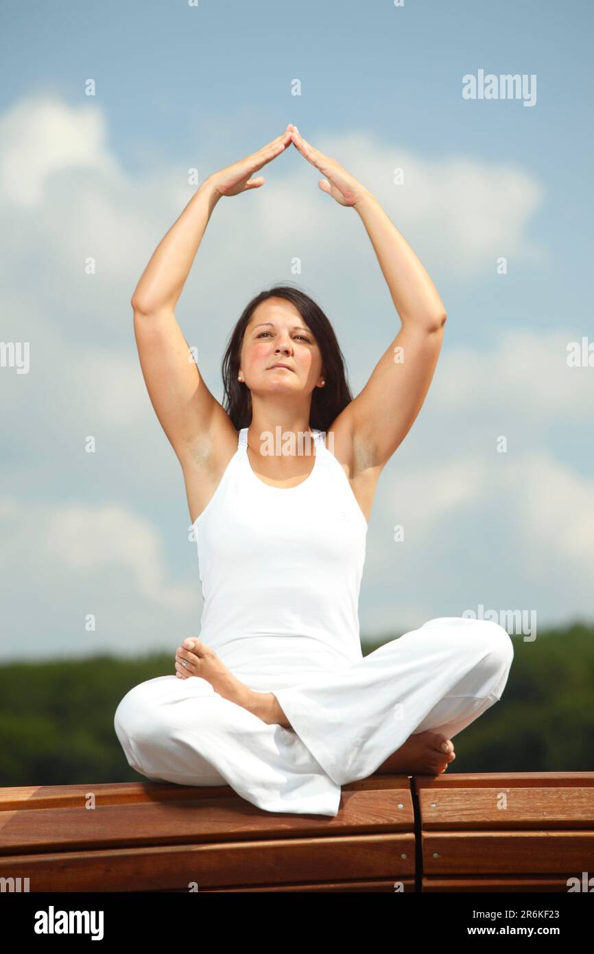 Half lotus yoga pose hires stock photography and images Alamy