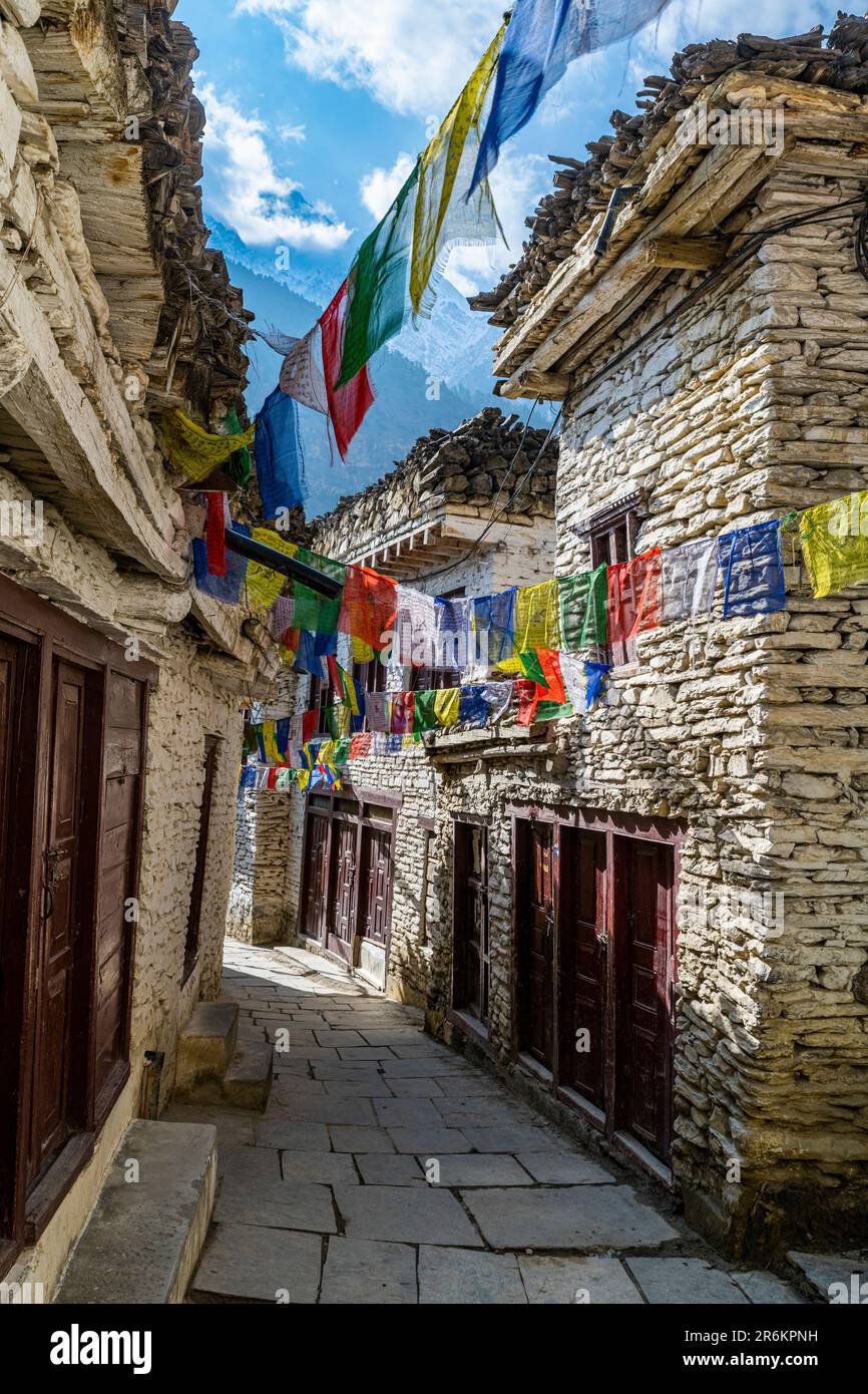 Historical village of Marpha and prayer flags, Jomsom, Himalayas, Nepal ...