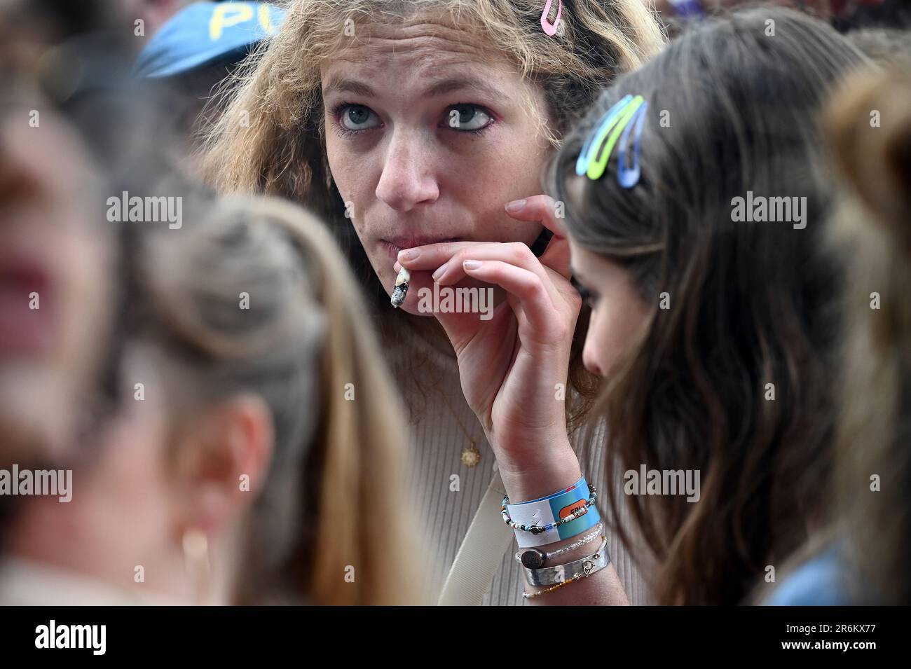 New York, USA. 09th June, 2023. A concert-goer smokes at The Governor's Ball NYC Music Festival held at Flushing Meadows Corona Park in the Queens borough of New York City, NY, June 9, 2023. (Photo by Anthony Behar/Sipa USA) Credit: Sipa USA/Alamy Live News Stock Photo