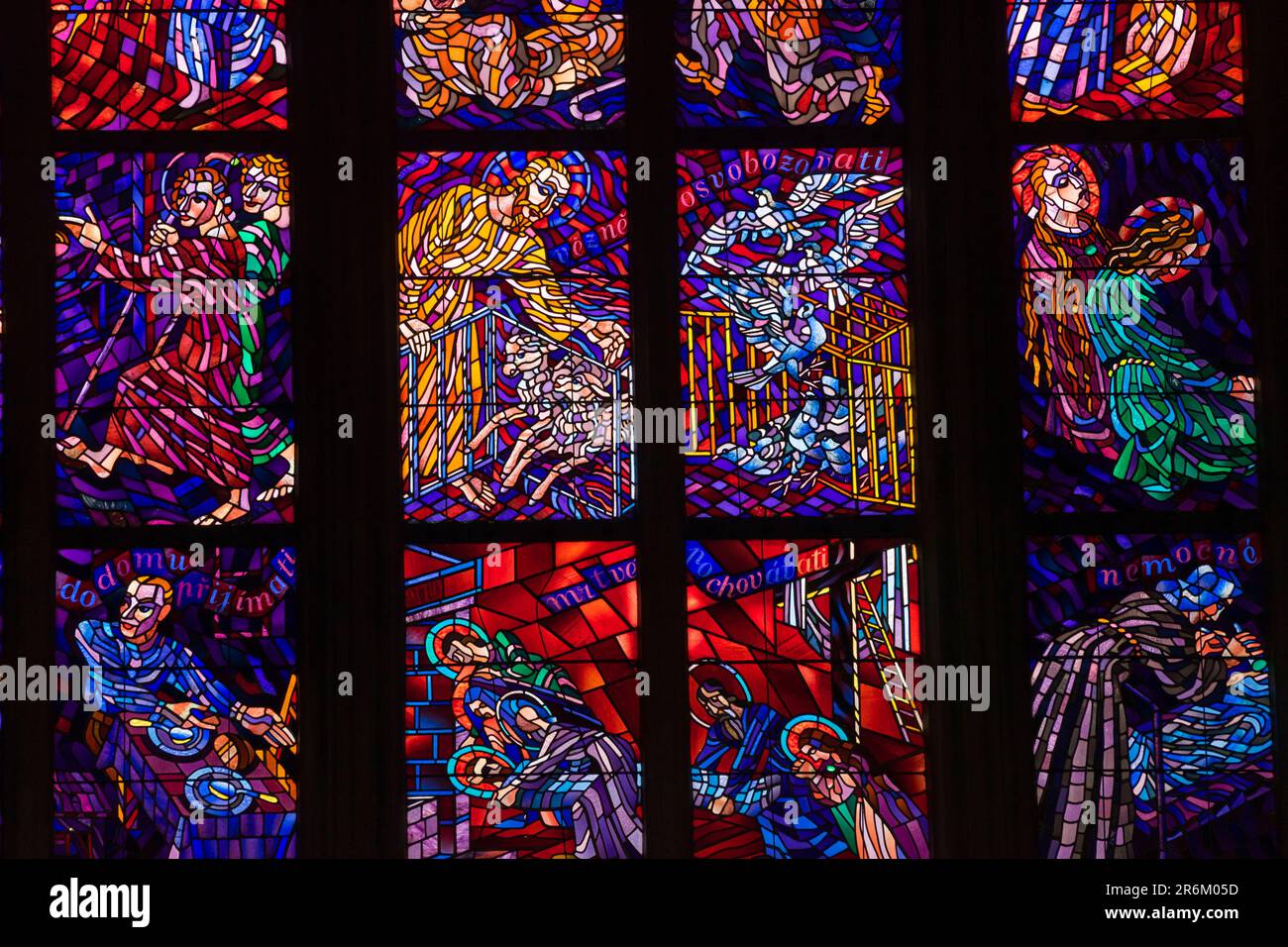Detail of colorful stained glass window inside St. Vitus Cathedral, Prague Castle, UNESCO World Heritage Site, Prague, Bohemia Stock Photo