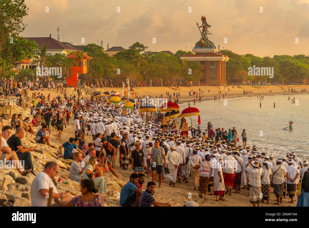 View of colourful offerings procession on Kuta Beach for Nyepi, Balinese New Year Celebrations, Kuta, Bali, Indonesia, South East Asia, Asia Stock Photo