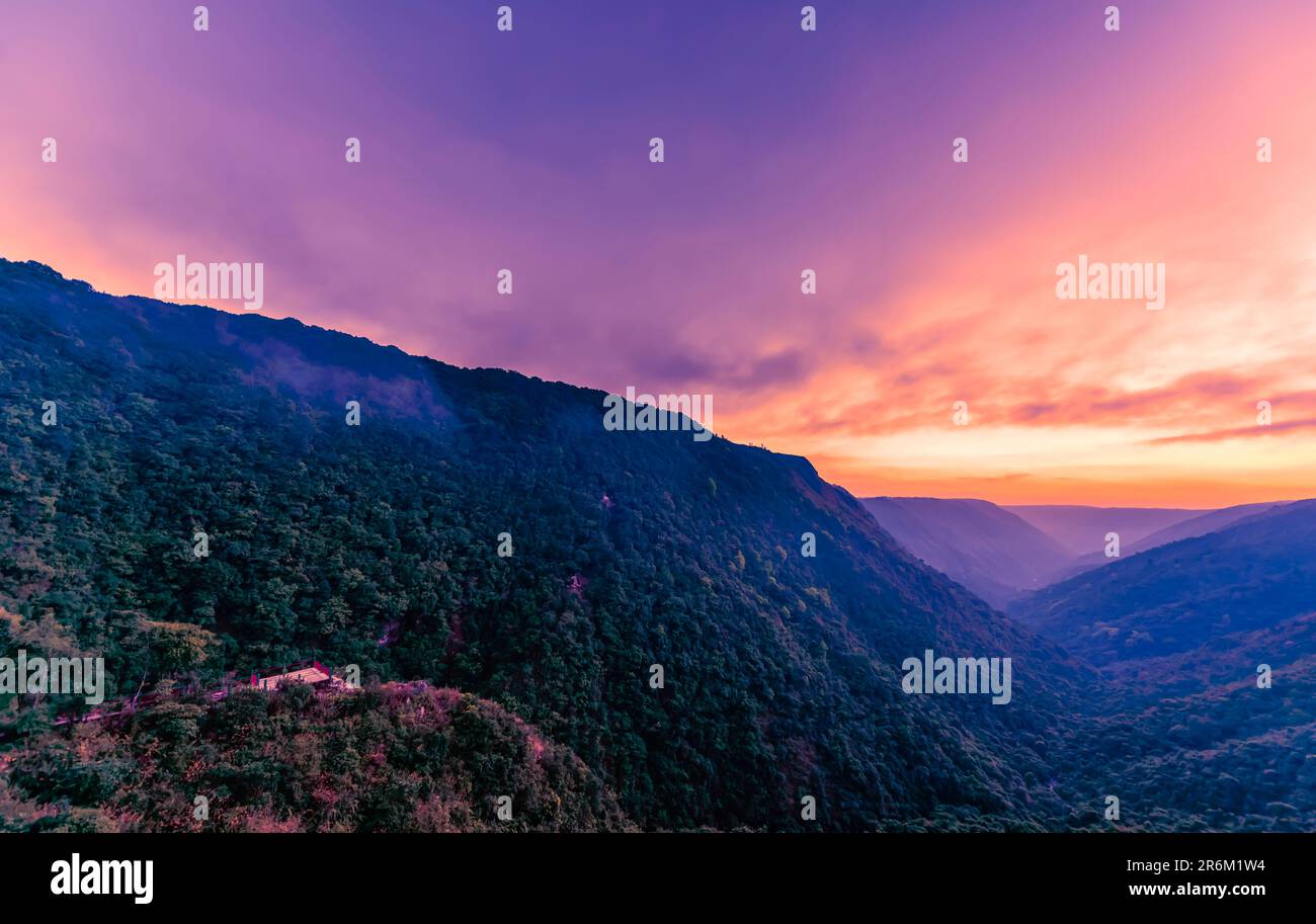 A view of the Mawkdok Dympep valley and its lush green mountain, located in Cherrapunji / Cherrapunjee / Sohra, Meghalaya, India. Stock Photo