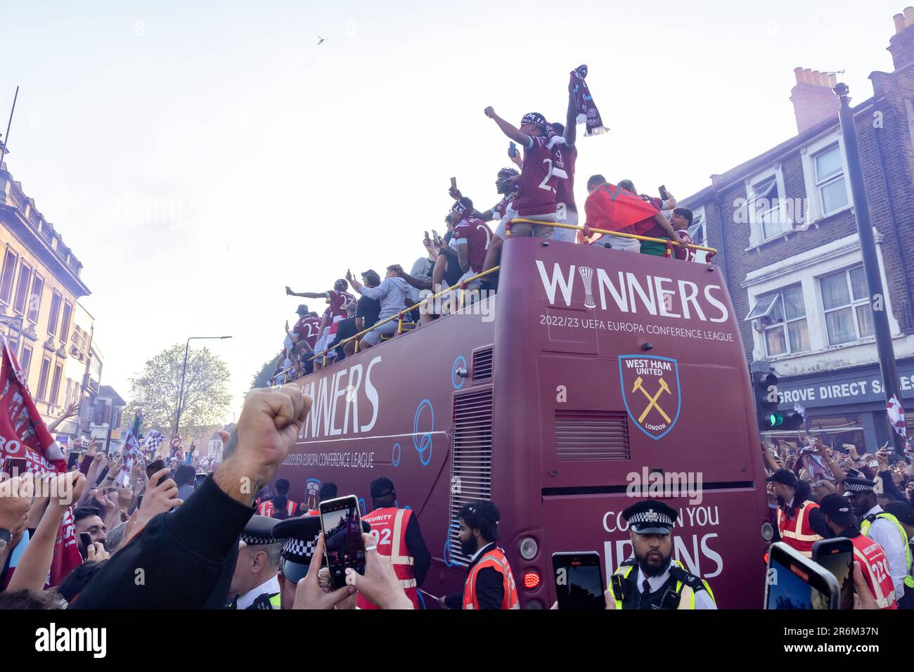 London, UK. 8th June, 2023. West Ham United footballers receive a hero's welcome from supporters in Barking Road close to the club's former Boleyn Ground stadium in Upton Park during a UEFA Europa Conference League victory parade. West Ham defeated ACF Fiorentina in the UEFA Europa Conference League Final on 7 June, winning their first major trophy since 1980. Credit: Mark Kerrison/Alamy Live News Stock Photo