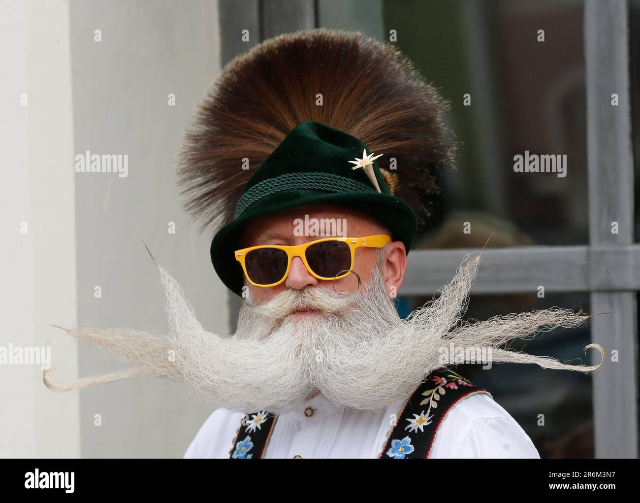 Burghausen, Germany. 10th June, 2023. A participant takes part in the second day of the World Beard and Mustache Championships at the Burghausen Town Hall. Credit: Uwe Lein/dpa/Alamy Live News Stock Photo