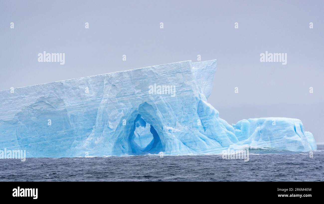 Iceberg with Arch, Bellingshausen Sea, Antarctica Stock Photo - Alamy
