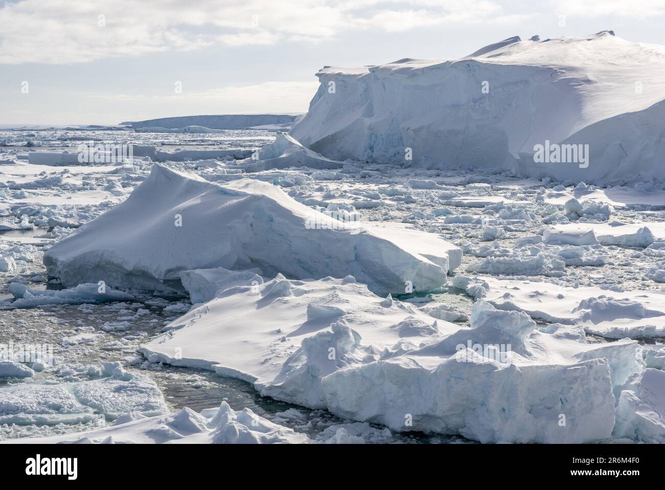 Ice Floes and Tabular Icebergs in Bright Sunshine, Amundsen Sea, Antarctica Stock Photo