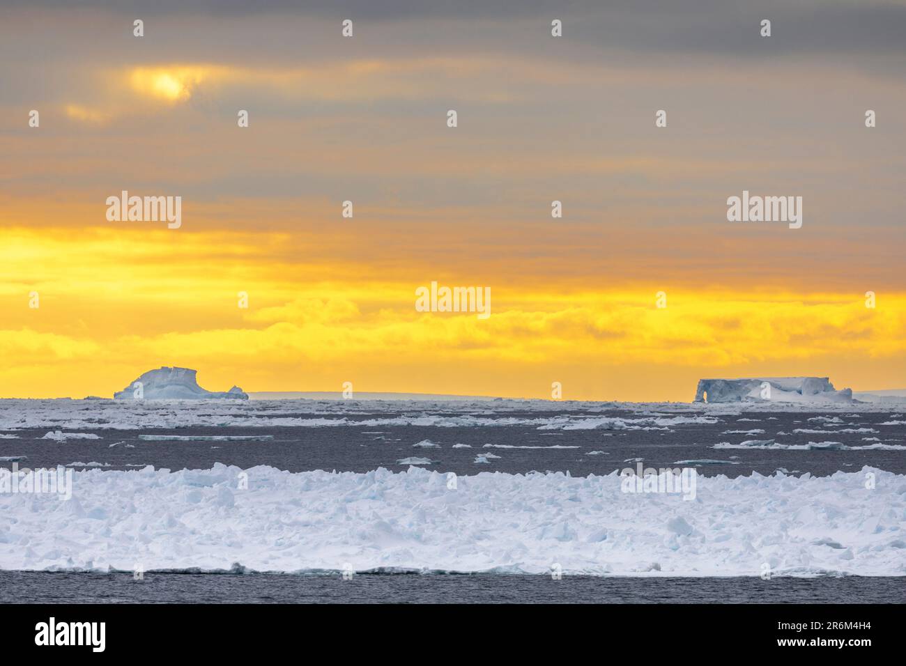Orange Late Evening Sky above Pack Ice, Amundsen Sea, Antarctica Stock Photo