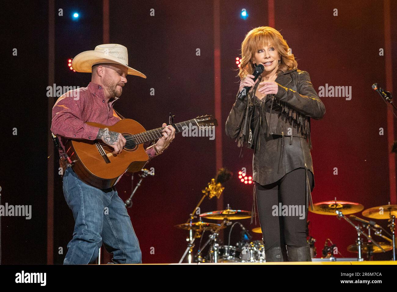 Cody Johnson, left, and Reba McEntire perform during the 2023 CMA Fest on Friday, June 9, 2023