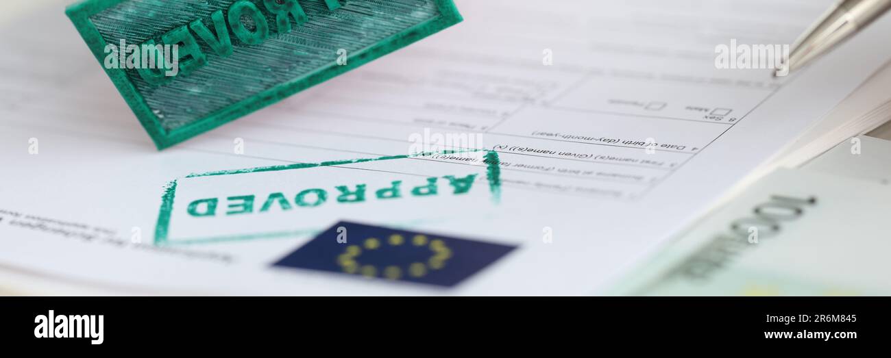 EU Schengen visa application and stamp approved document Stock Photo