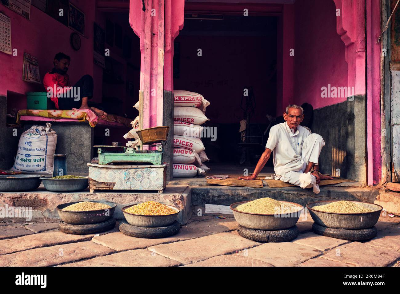 Vendors in legumes and spices shop. Jodhpur, Rajasthan, India Stock Photo