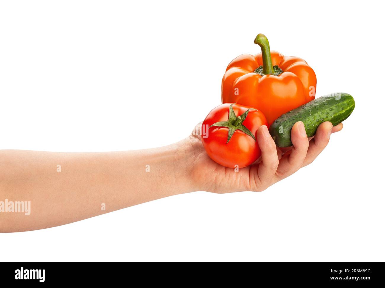 salad vegetable mix in hand path isolated on white Stock Photo